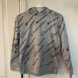 Boys gray Champion hoodie with black champion pattern size 10 / 12